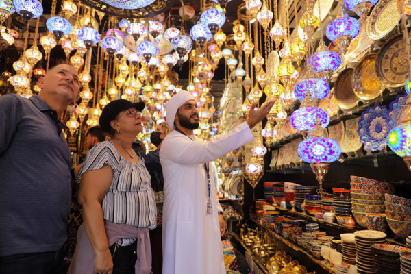 Dubai Walking Tour: Old City, Abra Ride, Souks, Heritage House, and Emirati Food